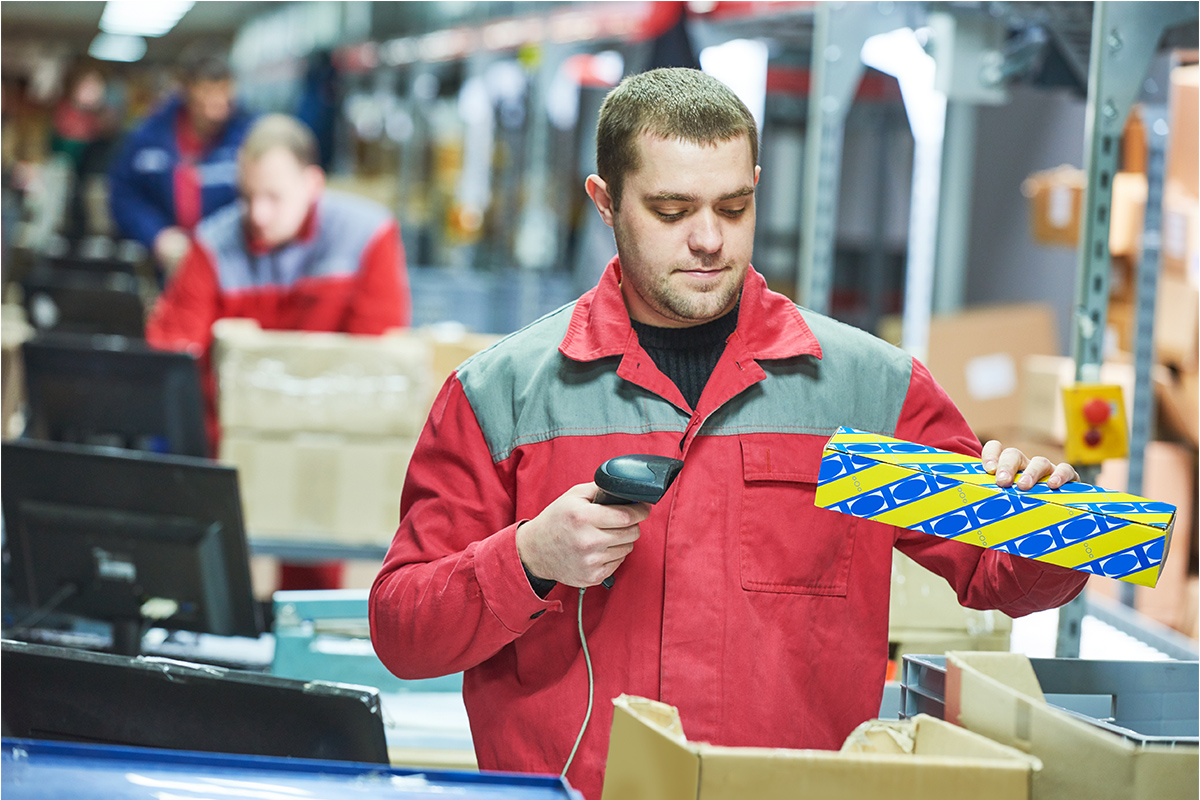 worker-with-laser-barcode-scanner.jpg