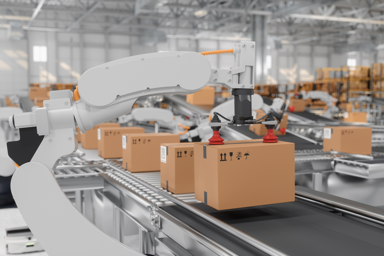 Robotic arms facilitating multichannel fulfillment by carrying carton boxes on a conveyor belt in a smart distribution warehouse, showcasing advanced automation in logistics.